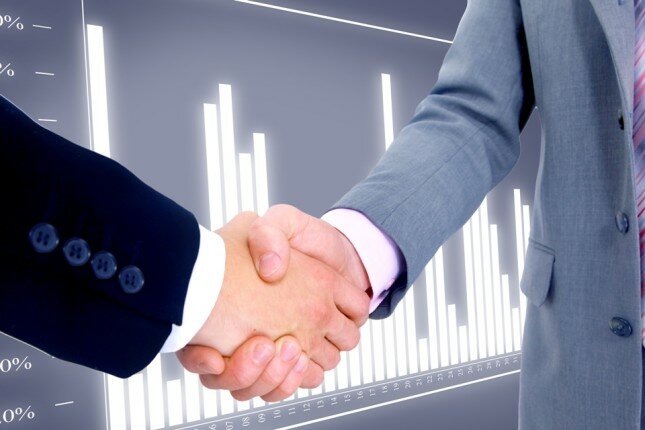 handshake isolated on business background