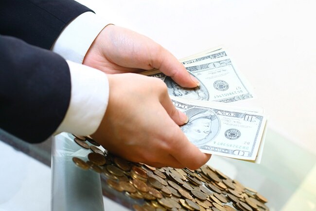 hands hold money